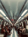 Vertical shot of Singapore Mass Rapid Transit interior at night