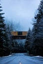 Vertical shot of snowy Willamette highway 58 near Odell Lake in Oregon, USA in winter