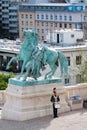 Vertical shot of a soldier playing the drums near the Budapest Palace in Hungary