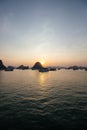 Vertical shot of The South China Sea during sunset in Halong Bay, Vietnam Royalty Free Stock Photo