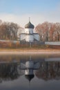 Spaso-Preobrazhensky Cathedral of the Mirozhsky monastery reflected in the water of the Great river.