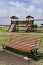 Vertical shot of a square bench instead of wooden games