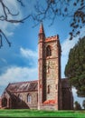 Vertical shot of the St Donard's Community Church in Dundrum Ireland against the blue sky