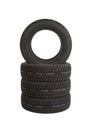 Vertical shot of a stack of car tires isolated on a white background Royalty Free Stock Photo