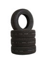 Vertical shot of a stack of car tires isolated on a white background Royalty Free Stock Photo