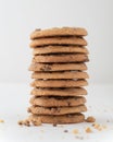 Vertical shot of a stack of chocolate chip cookies isolated on white background Royalty Free Stock Photo