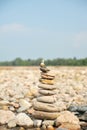 Vertical shot of stacked rocks near Murti River in WBengal, India