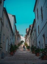 Vertical shot of a stairway between residential buildings in the daytime