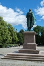 Vertical shot of Statue of Henrik Wergeland seen from behind