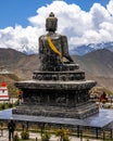 Vertical shot of a statue of The Holy Tibetan Buddha shrine of Muktinath Upper Mustang, Nepal
