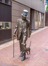 Vertical shot of the statue of John Plimmer and his dog in Wellington, New Zealand.