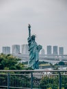 Vertical shot of the Statue of Liberty replica in Odaiba, Tokyo, Japan Royalty Free Stock Photo