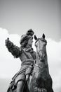 Vertical shot of the statue of Louis XIV near the Palace of Versailles in Paris, France