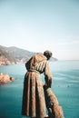 Vertical shot of the Statue of Saint Francis of Assisi with dog in Monterosso Al Mare, Italy Royalty Free Stock Photo