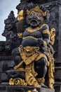 Vertical shot of a statue at Tanah Lot temple in Beraban Indonesia