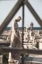 Vertical shot of the statues of women in the old San Juan cemetery, Puerto Rico