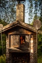 Vertical shot of stone pizza oven with flame Royalty Free Stock Photo