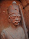 Vertical shot of a stone soldier statue