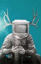 Vertical shot of Street art graffiti, a man with TV head and deer horns looking at phone