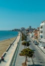 Vertical shot of a street and buildings on Finikoudes Beach from Larnaca Castle