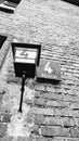 Vertical shot of a street light with the block number 4 on it in Auschwitz concentration camp Royalty Free Stock Photo