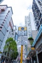 Vertical shot of the street with tall buildings, Hong Kong, China