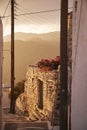 Vertical shot of the streets of Aegiali in Amorgos Island, Greece at sunset