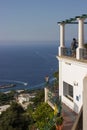 Vertical shot of the streets of Capri Island and the sea in Italy