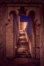 Vertical shot of stunning old Arabic market in the Middle East with lighted staircase at night