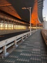 Vertical shot of sunlight and shadows on the Rainbow Bridge in Tokyo, Japan Royalty Free Stock Photo