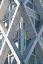 Vertical shot of a symmetrical white concrete building captured at day time