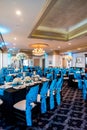 Vertical shot of the table setting in the wedding hall