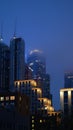 Vertical shot of tall residential buildings at night