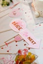 Vertical shot of team bride signs in pink color