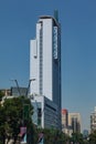 Vertical shot of Telefonica tower modern building in Santiago do Chile under blue sky