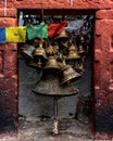 Vertical shot of Tibetan Buddhist bells and prayer flags and chimes in Kathmandu, Nepal