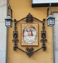 Vertical shot of tiles painted with the Virgin Our Lady of Mercy in a street in Granada, Spain Royalty Free Stock Photo