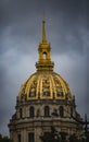 Vertical shot of Tomb of Napoleon Bonaparte under a cloudy sky on a rainy day in Paris, France Royalty Free Stock Photo