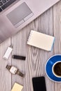 Vertical shot top view flat lay office workdesk on white table. Royalty Free Stock Photo