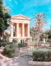 Vertical shot of tourists in Lower Barrakka Gardens in Malta, Valletta Royalty Free Stock Photo