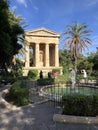 Vertical shot of tourists in Lower Barrakka Gardens in Malta, Valletta Royalty Free Stock Photo