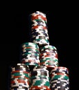 Vertical shot of a tower of colorful poker chips