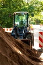 Vertical shot of the tractor on a construction land