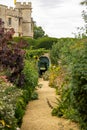Vertical shot of a trail in beautiful green Rousham Gardens in England