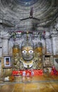 Vertical shot of Trimurti 3 Gods statues inside the Samadhisvar Temple in Rajasthan, India Royalty Free Stock Photo