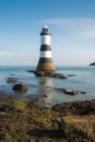 Vertical shot of the Trwyn Du Lighthouse in Wales, UK