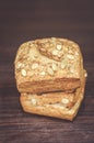 Vertical shot of two pieces of bread on the table Royalty Free Stock Photo