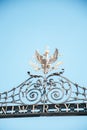 Vertical shot of a university gate symbol of an eagle