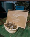 Vertical shot of an unplugged ceremony sign encouraging people to turn off phones at a wedding Royalty Free Stock Photo