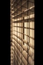 Vertical shot of venetian blinds creating a moody and noir inspired atmosphere Royalty Free Stock Photo